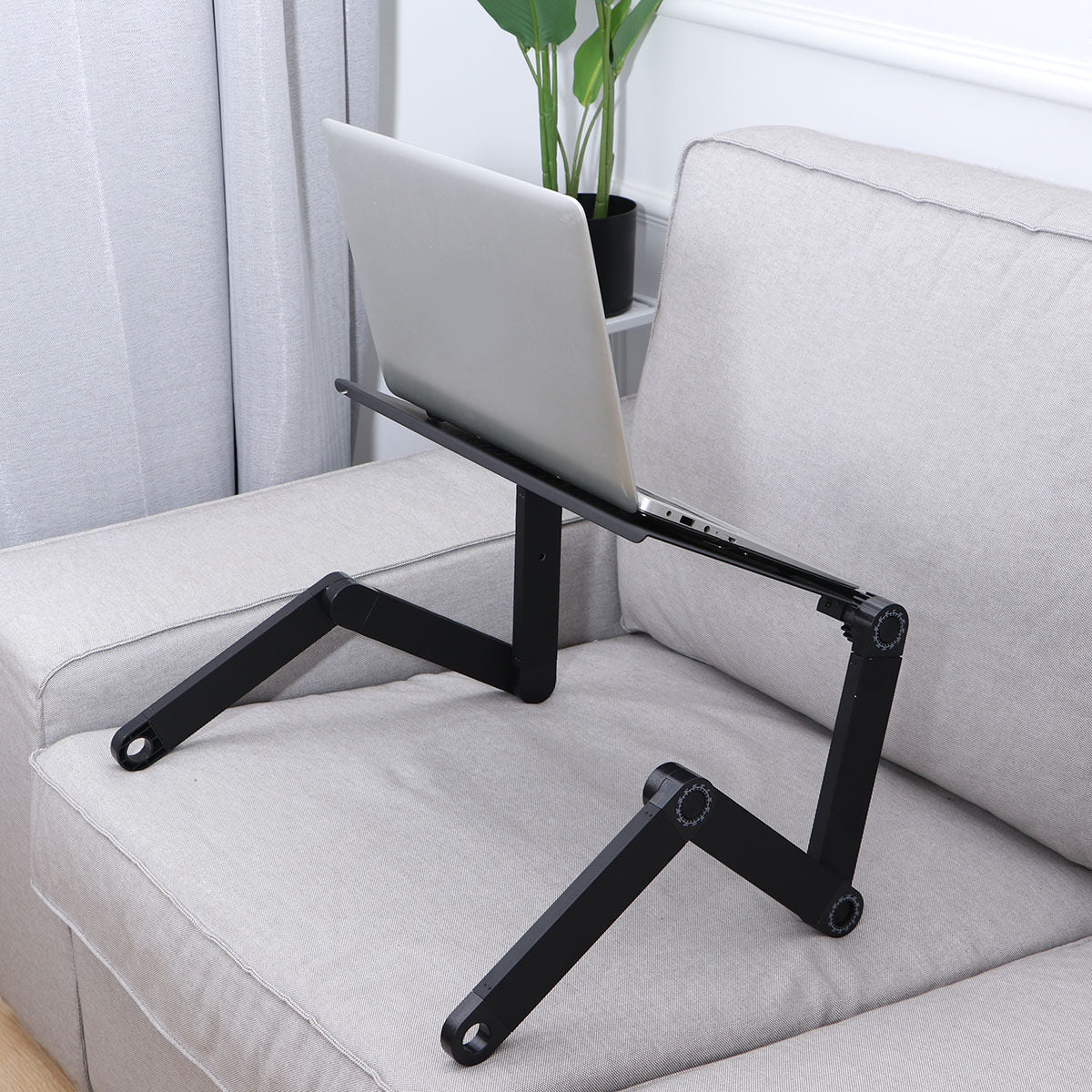 Novara Adjustable Ergonomic Laptop Stand with Mouse Pad and Cooling Fan