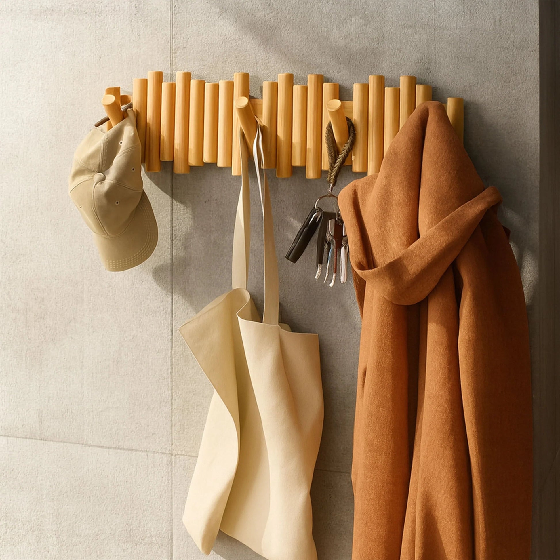 Sovere Wooden Wall Coat Rack with Fold-Down Hooks for Entryway Storage 1